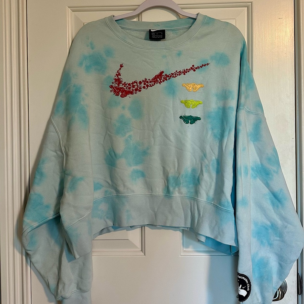 Nike Light Blue Cropped Sweatshirt with Black Patch’s